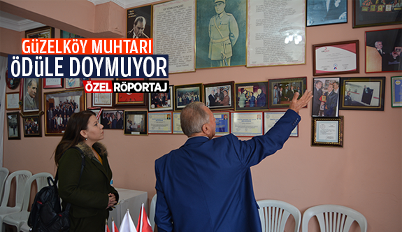 GÜZELKÖY MUHTARI ÖDÜLE DOYMUYOR