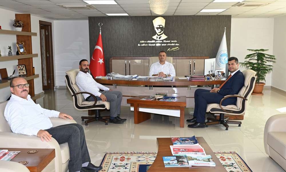  Aslay, Mhp Ahmetli il&ccedil;e başkanını ağırladı