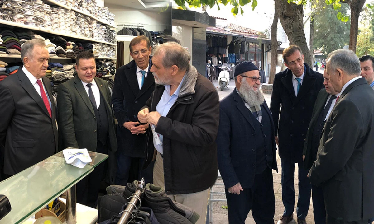 MHP’Lİ AKÇAY ESNAFIN SORUNLARI DİNLEDİ